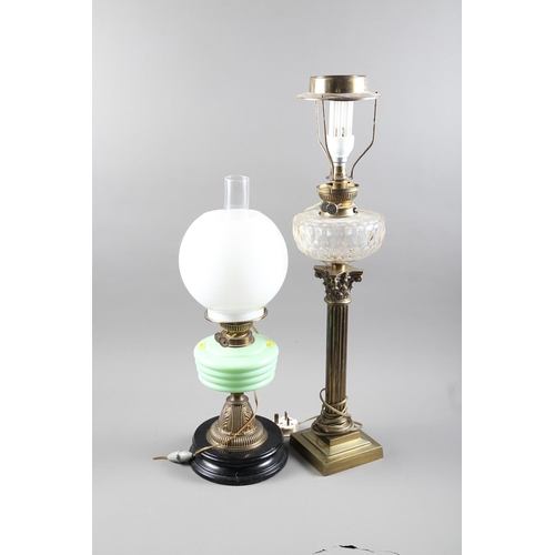 309 - An early 20th century brass oil lamp with Corinthian column and faceted clear glass reservoir, on sq... 