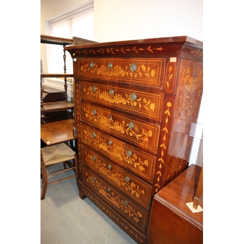 546 - An 19th century Dutch marquetry chest of six long graduated drawers, with swag and a lyre design, ri... 