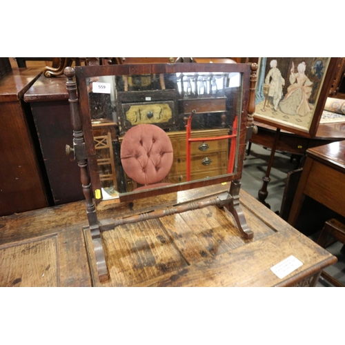 559 - A 19th century swing frame mirror, on skeleton stand, 20