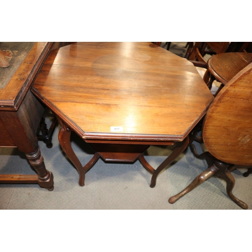 617 - A 1920s walnut octagonal two-tier occasional table, on cabriole supports, 30