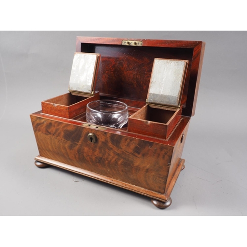 196 - A mahogany sarcophagus tea caddy, on bun feet with associated mixing bowl, 12 1/2