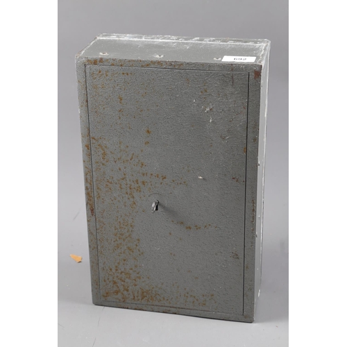 692 - A Chubb steel wall safe with fixing bolts, 360mm high x 226mm wide x 106mm deep