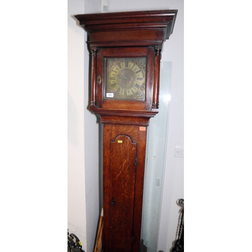 555 - An early 18th century provincial oak long case clock with 8 1/2