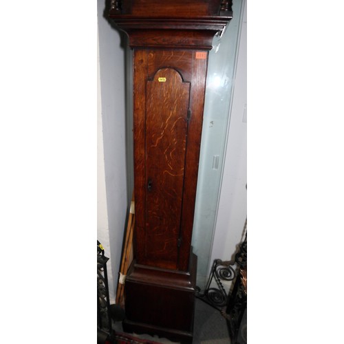 555 - An early 18th century provincial oak long case clock with 8 1/2