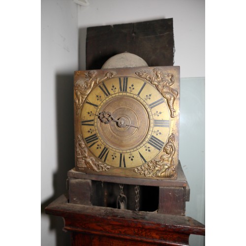 555 - An early 18th century provincial oak long case clock with 8 1/2