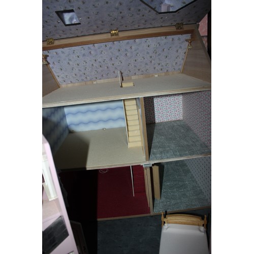 236 - A dolls' house and a quantity of dolls house of furniture