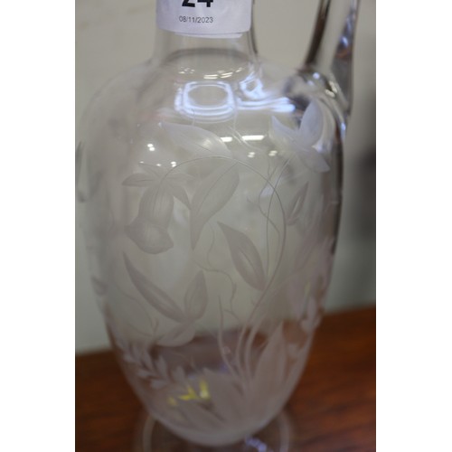 24 - A late 19th century engraved carafe, 11