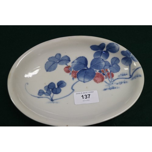 137 - A pair of Chinese oval shaped platters with landscape decoration, 13 1/4