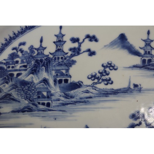 137 - A pair of Chinese oval shaped platters with landscape decoration, 13 1/4