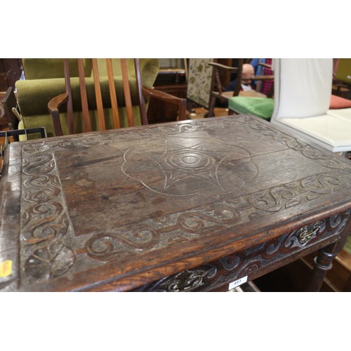 493 - An 18th century provincial carved oak side table, fitted one drawer, on turned and stretchered suppo... 