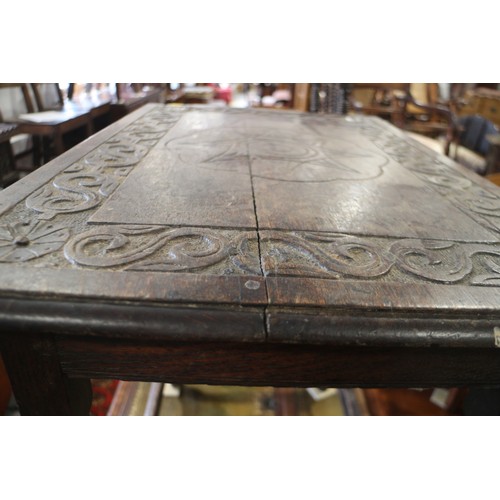 493 - An 18th century provincial carved oak side table, fitted one drawer, on turned and stretchered suppo... 