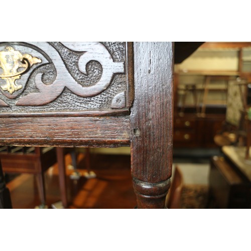 493 - An 18th century provincial carved oak side table, fitted one drawer, on turned and stretchered suppo... 