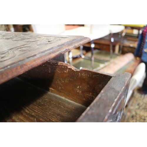 493 - An 18th century provincial carved oak side table, fitted one drawer, on turned and stretchered suppo... 