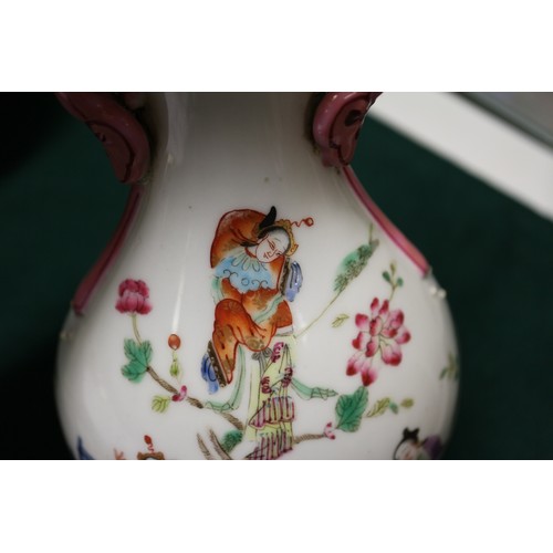 117 - A Chinese famille rose vase shaped wall pocket, decorated four figures, seal mark to base, a similar... 