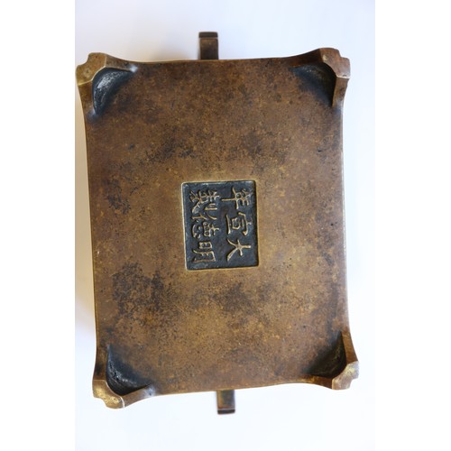 142 - A Chinese bronze rectangular-section censer, six-character mark to base, a Chinese bronze coconut-sh... 