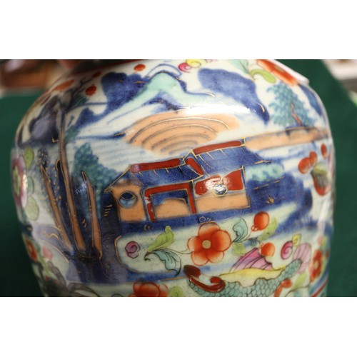 129 - A pair of blue and white ginger jars and covers, 10