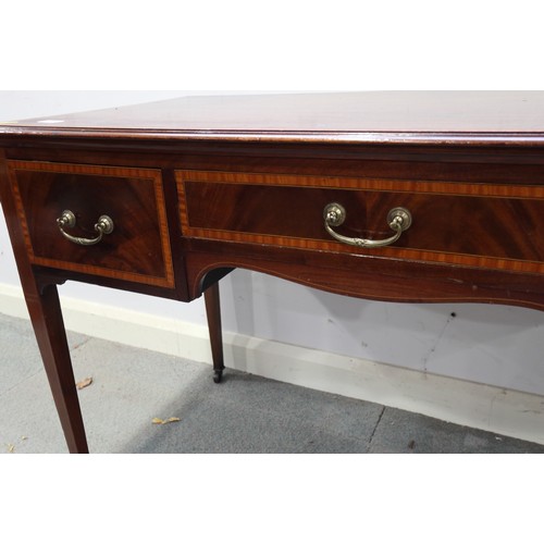 651 - An Edwardian mahogany and banded dressing table, fitted three drawers, on square taper supports, 47