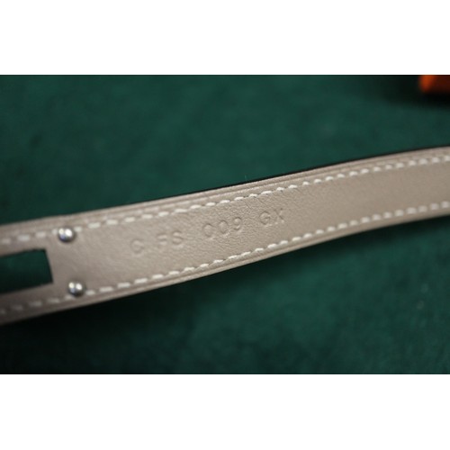 281 - A Hermes brown leather and white metal mounted bracelet