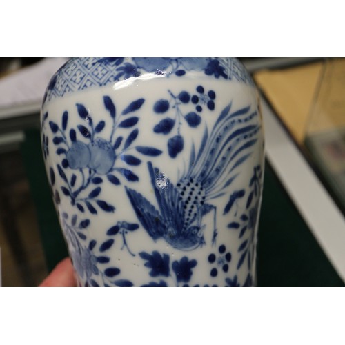 61 - A Chinese porcelain blue and white cylinder vase, 10