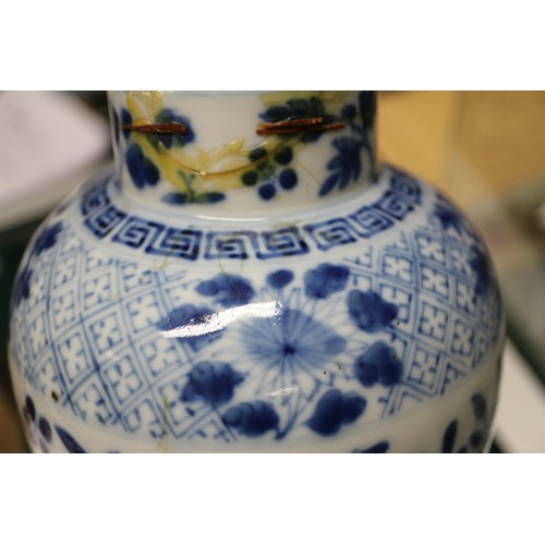 61 - A Chinese porcelain blue and white cylinder vase, 10