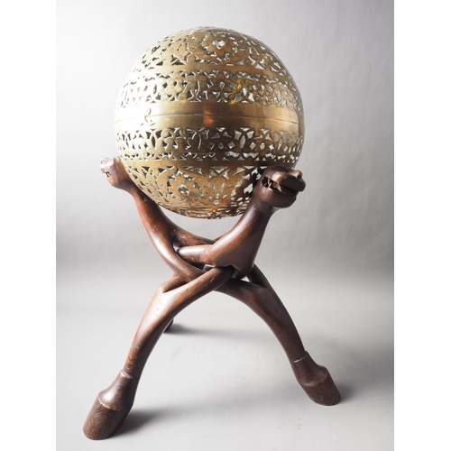 104 - An antique pierced and engraved brass spherical incense holder, 12 1/2