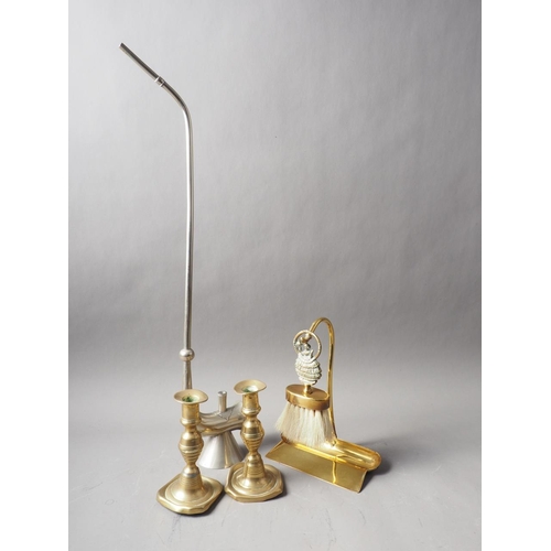 105 - A pair of brass candlesticks, on square bases, 6