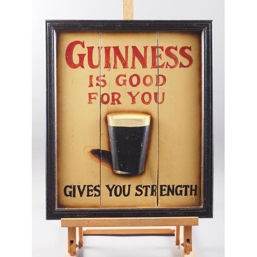 182 - A Guinness advertisement mirror, 