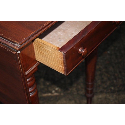 445 - A Cuban mahogany Pembroke table fitted two drawers on turned, ringed and tapered supports, 42 1/2