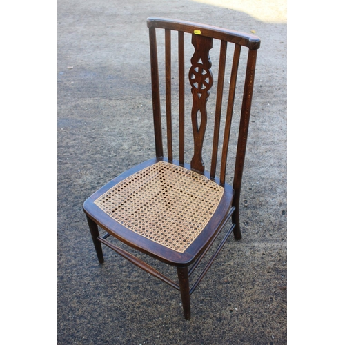 465 - A Windsor lath back nursing chair with cane seat, on turned and stretchered supports, and a Windsor ... 