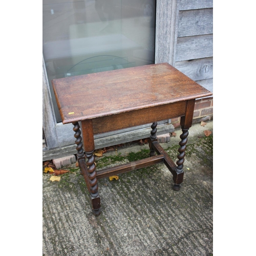 475 - An oak side table of 17th century design, on barley twist stretchered supports, 30