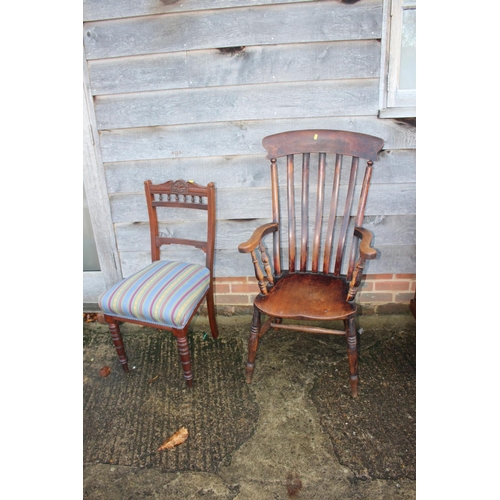 479 - A Windsor lath back elbow chair and a walnut side chair