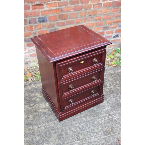 505 - A reproduction chest of three drawers, 20