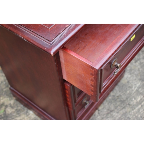 505 - A reproduction chest of three drawers, 20