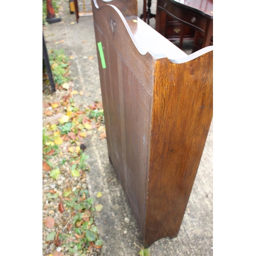 509 - A near pair of 1930s oak four-tier open bookcases, 24