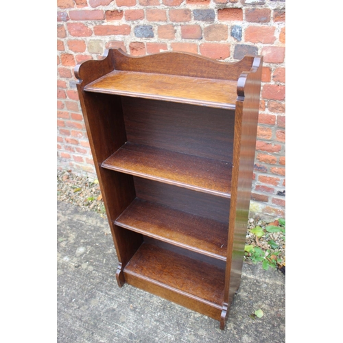 509 - A near pair of 1930s oak four-tier open bookcases, 24