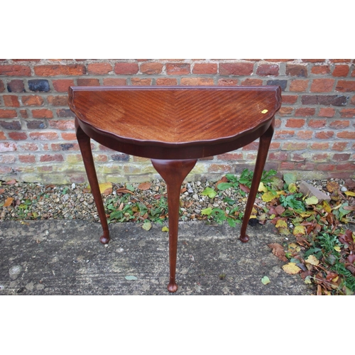 513 - Two reproduction mahogany tray top semi-circular side tables, 29