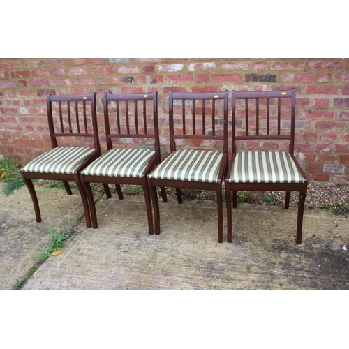 515 - A set of four reproduction mahogany side chairs with drop-in seats and a carver chair with striped d... 