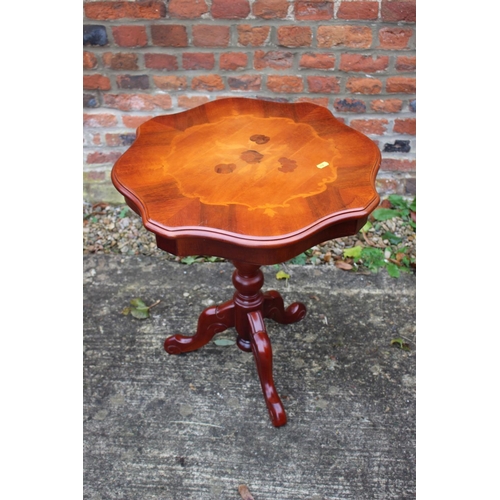 517 - A pair of marquetry shape top occasional tables, on tripod supports, 20