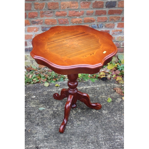 517 - A pair of marquetry shape top occasional tables, on tripod supports, 20