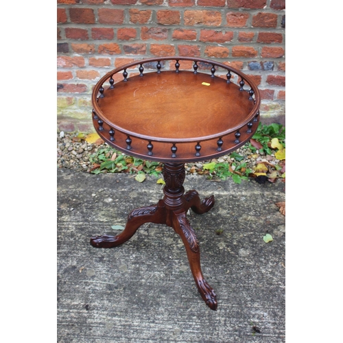 520 - A pair of carved mahogany gallery topped wine tables, 19