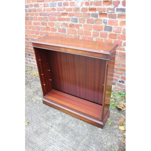 521 - A mahogany open bookcase, 36