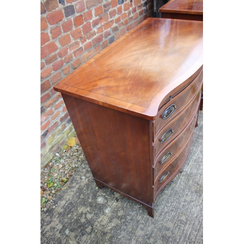 525 - A pair of bachelor's walnut, yew and banded serpentine chests of four long drawers, on splay bracket... 