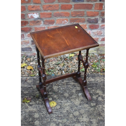 526 - A mahogany circular top occasional table with tooled lined top and a single quartetto table