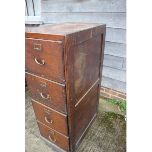 547 - An early 20th century oak four-drawer filing cabinet with brass scroll handles, 18