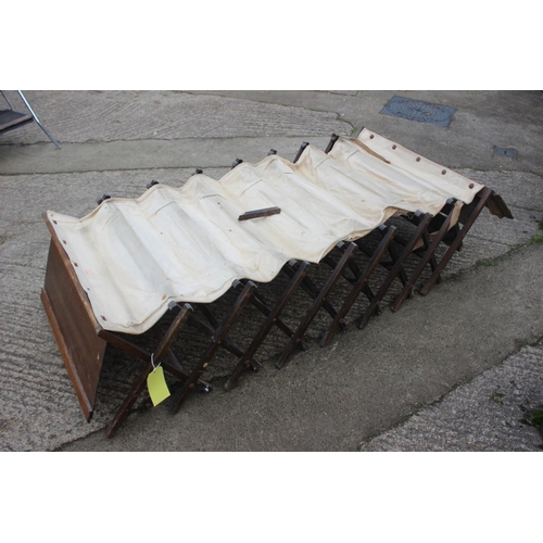 548 - A WWI camp bed, in oak cabinet, said to have belonged to S M De H Whatton DSO MC, 32