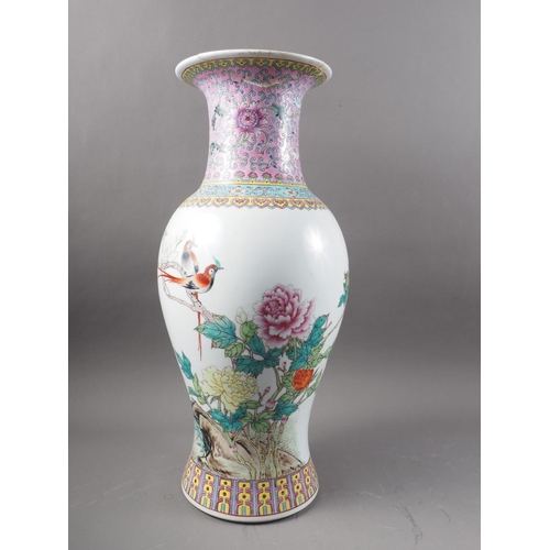 62 - A Canton enamel vase with floral decoration, 19