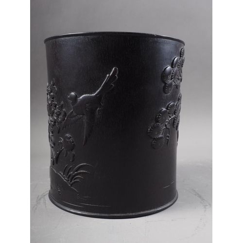 69 - A Chinese Zitan cylindrical brush pot, with carved bird, tree and landscape decoration, 6