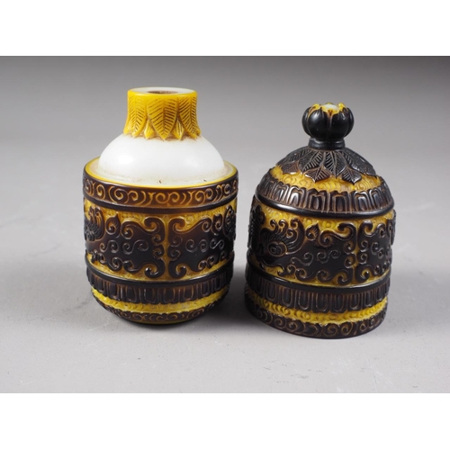 70 - A Chinese Peking glass snuff bottle with scrolled and bat decoration, 3 3/4