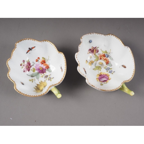 9 - A pair of Dresden porcelain floral decorated leaf shape cups, 4 3/4