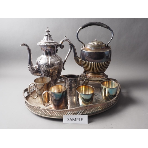 246 - Three silver plated gallery trays, two plated coffee pots, a pair of plated cups, two plated beakers... 